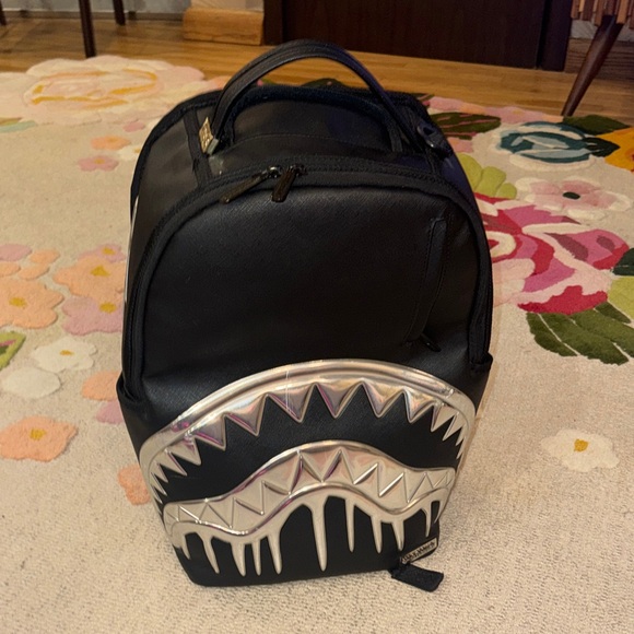 Sprayground limited edition Black Backpack with Silver Shark Design